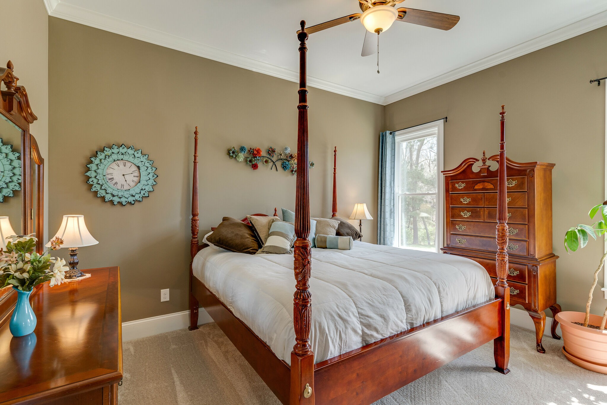 8882 New Chapel Road Springfield, TN 37172 - Photo 24 of 60 a bedroom with a bed chandelier and a window