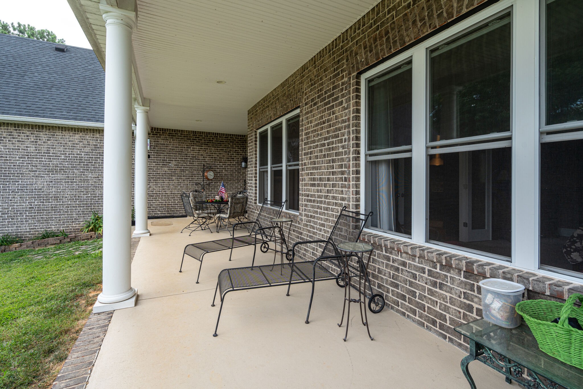 8882 New Chapel Road Springfield, TN 37172 - Photo 37 of 60 a balcony with furniture and potted plants