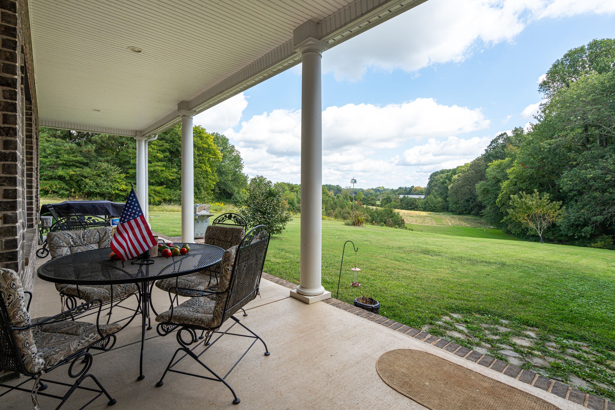 8882 New Chapel Road Springfield, TN 37172 - Photo 38 of 60 a view of a porch with furniture and yard