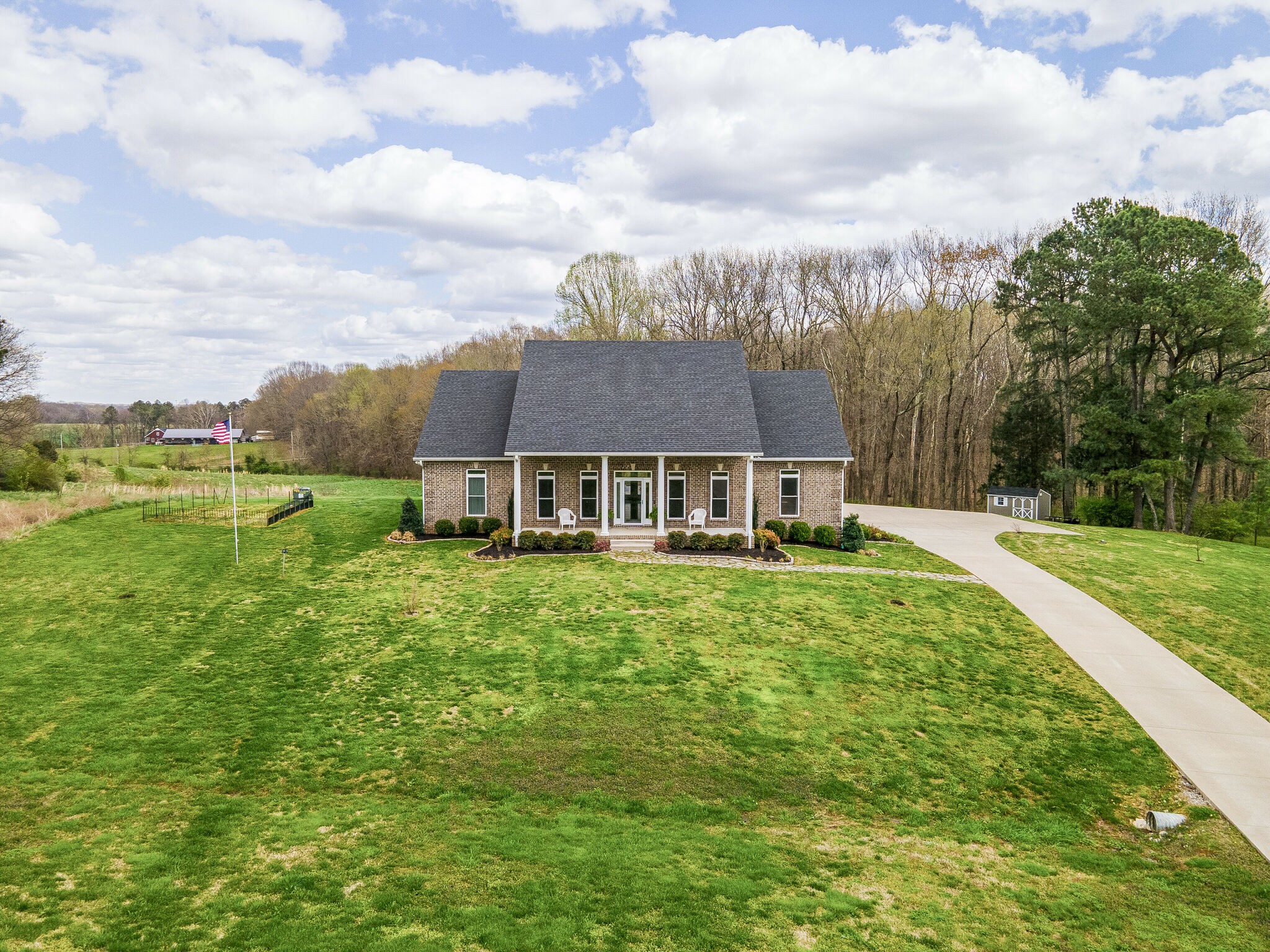 8882 New Chapel Road Springfield, TN 37172 - Photo 53 of 60 a view of a big house with a big yard and large trees
