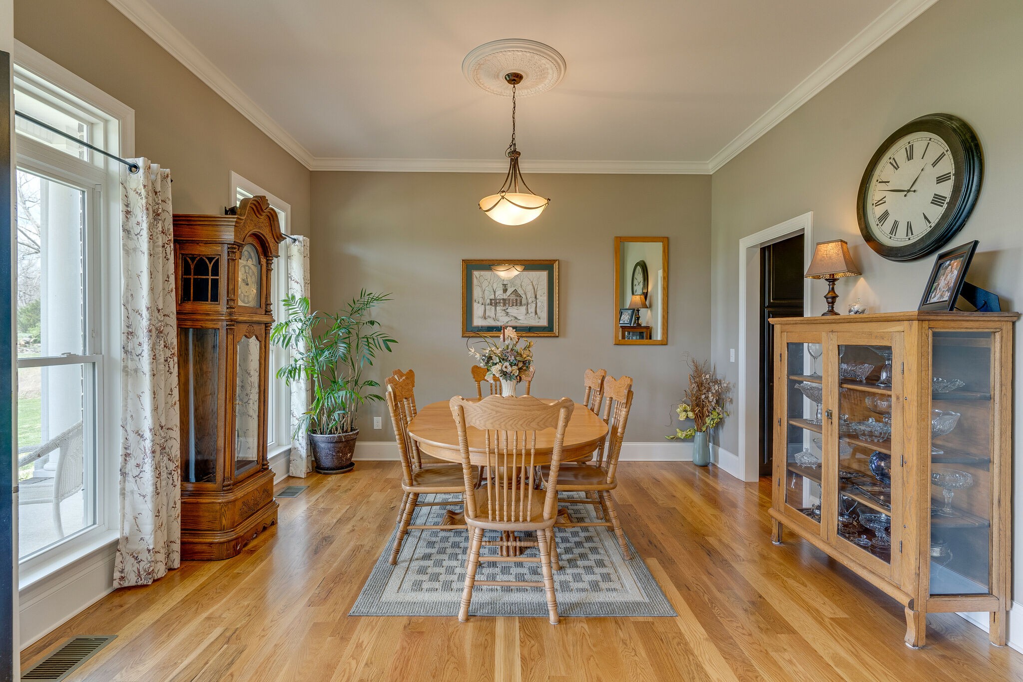 8882 New Chapel Road Springfield, TN 37172 - Photo 8 of 60 a view of a dining room with furniture window and wooden floor