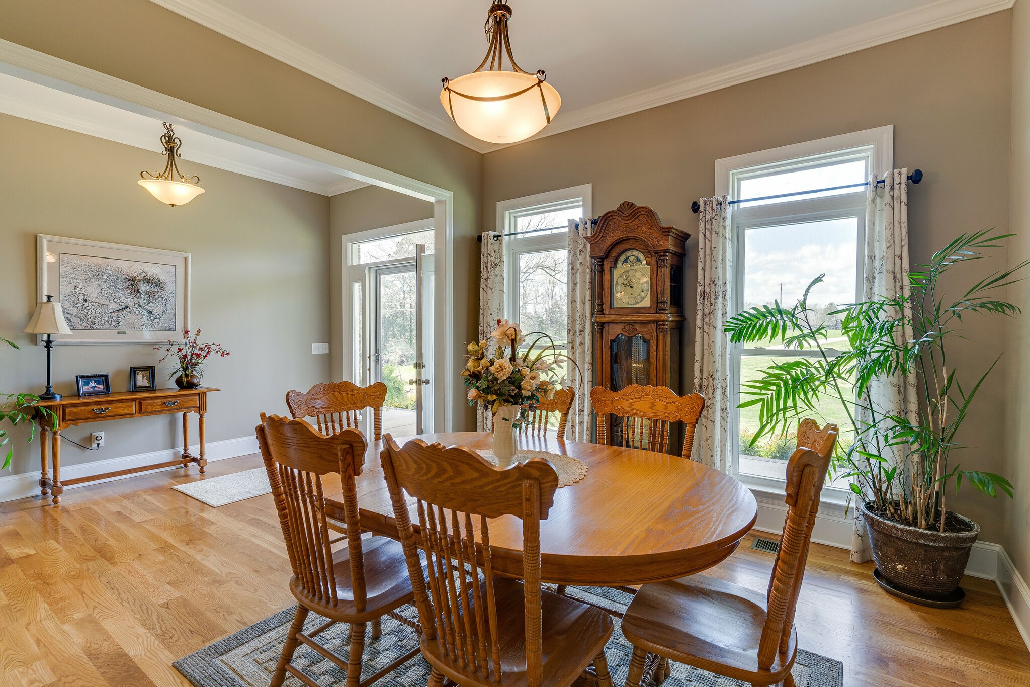 8882 New Chapel Road Springfield, TN 37172 - Photo 9 of 60 a view of a dining room with furniture and wooden floor