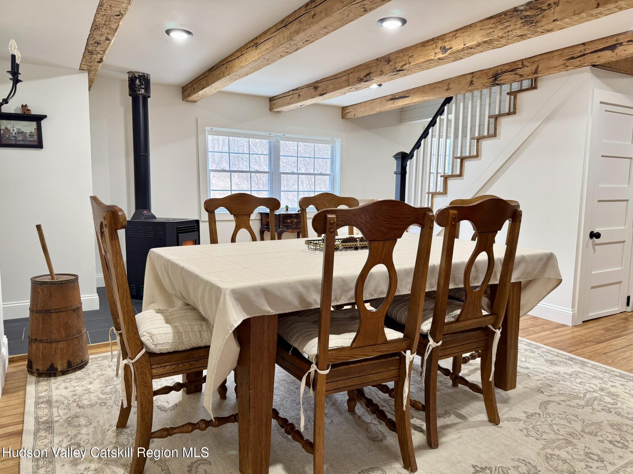 96 West Deans Mill Road New Baltimore, NY 12192 - Photo 12 of 60 a view of a dining room with furniture