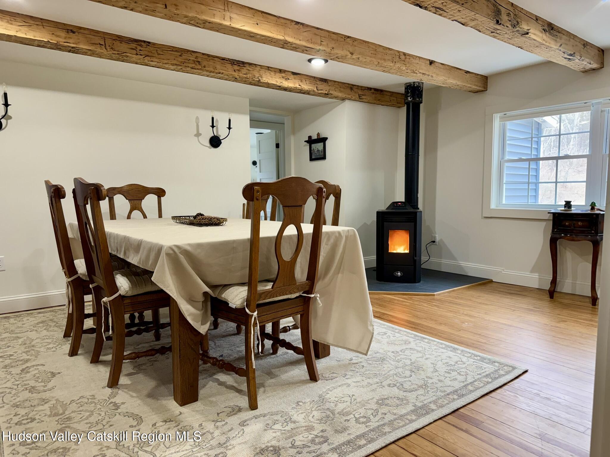 96 West Deans Mill Road New Baltimore, NY 12192 - Photo 14 of 60 a view of a dining room with furniture