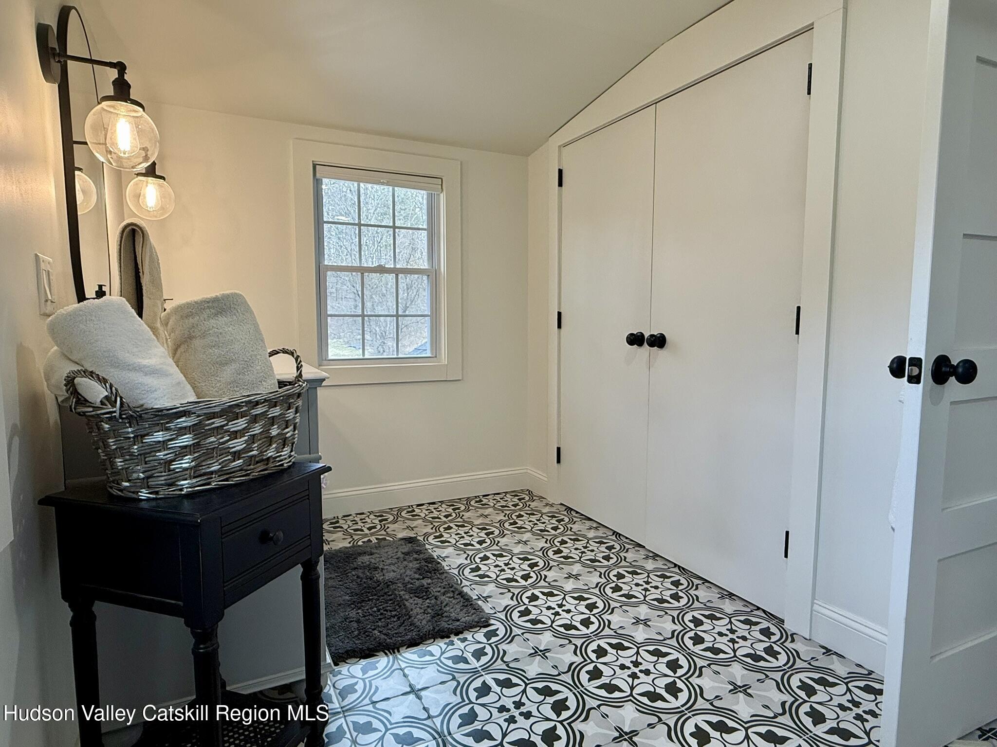 96 West Deans Mill Road New Baltimore, NY 12192 - Photo 25 of 60 a living room with a couch