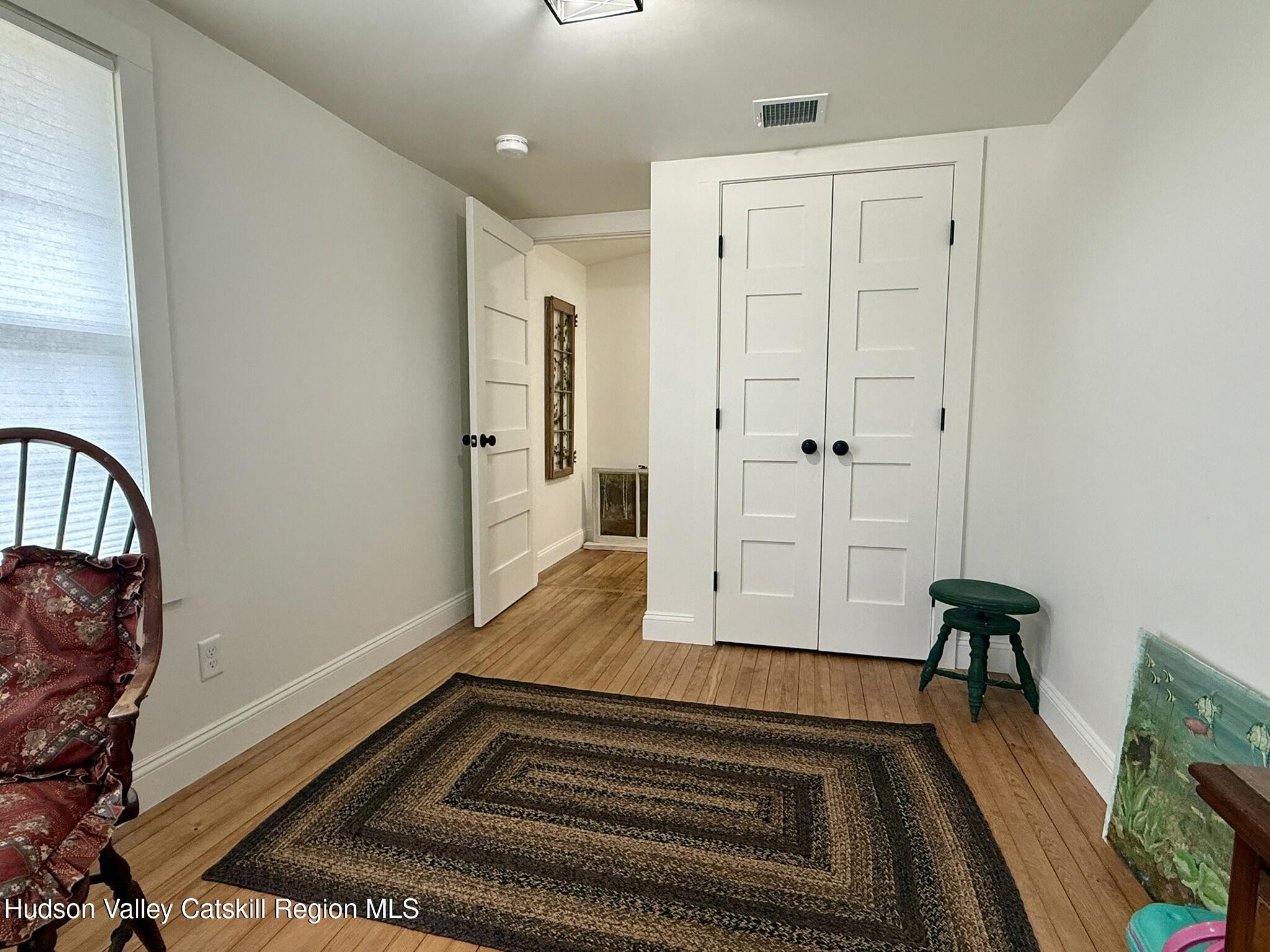 96 West Deans Mill Road New Baltimore, NY 12192 - Photo 34 of 60 a bathroom with a sink and a mirror