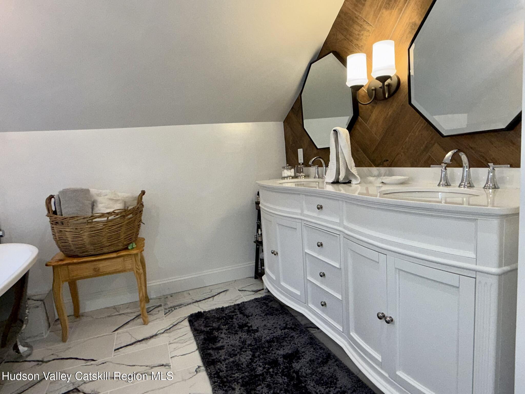 96 West Deans Mill Road New Baltimore, NY 12192 - Photo 44 of 60 a bathroom with a sink and a mirror
