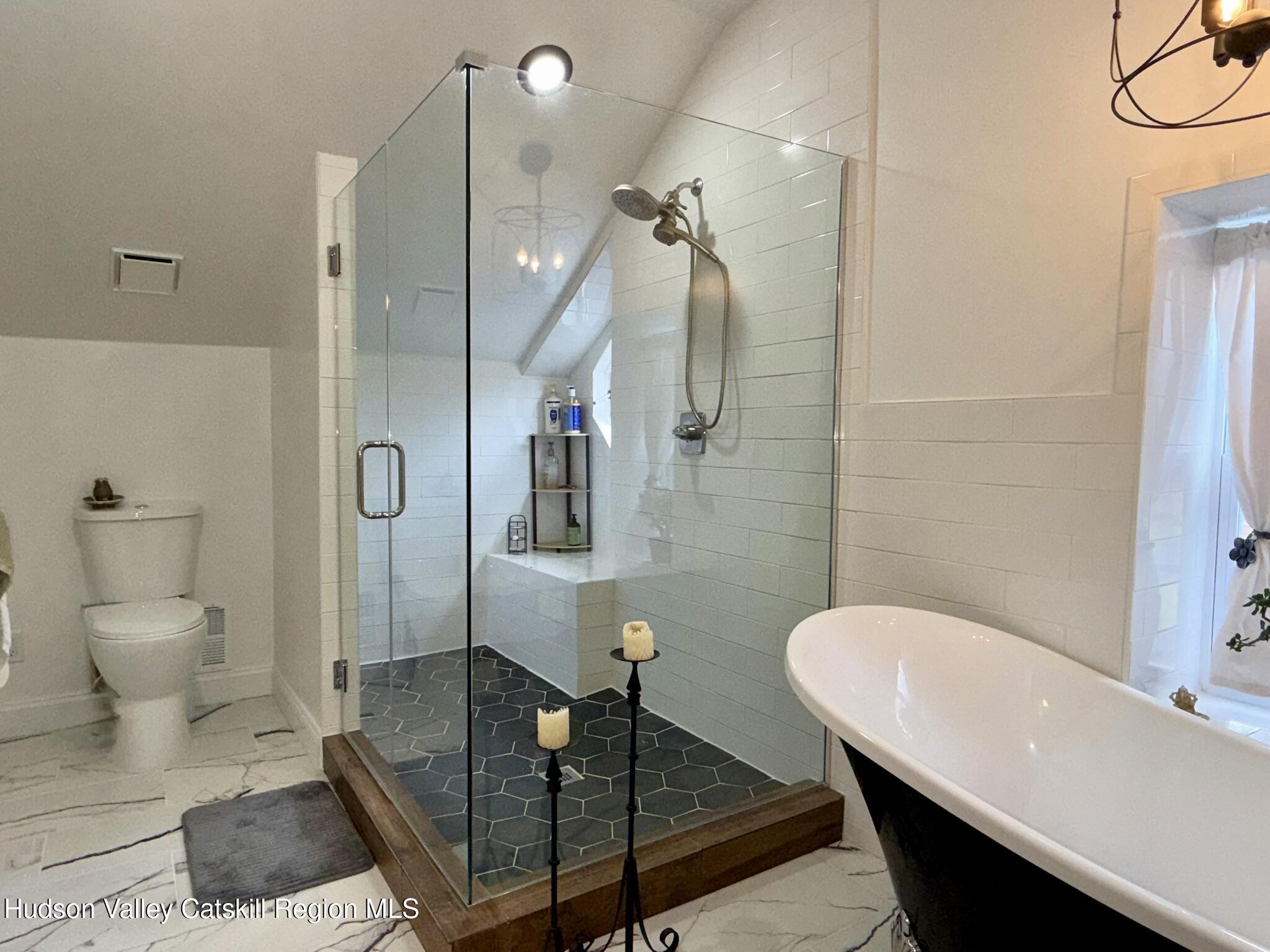 96 West Deans Mill Road New Baltimore, NY 12192 - Photo 45 of 60 a bathroom with a sink toilet and shower