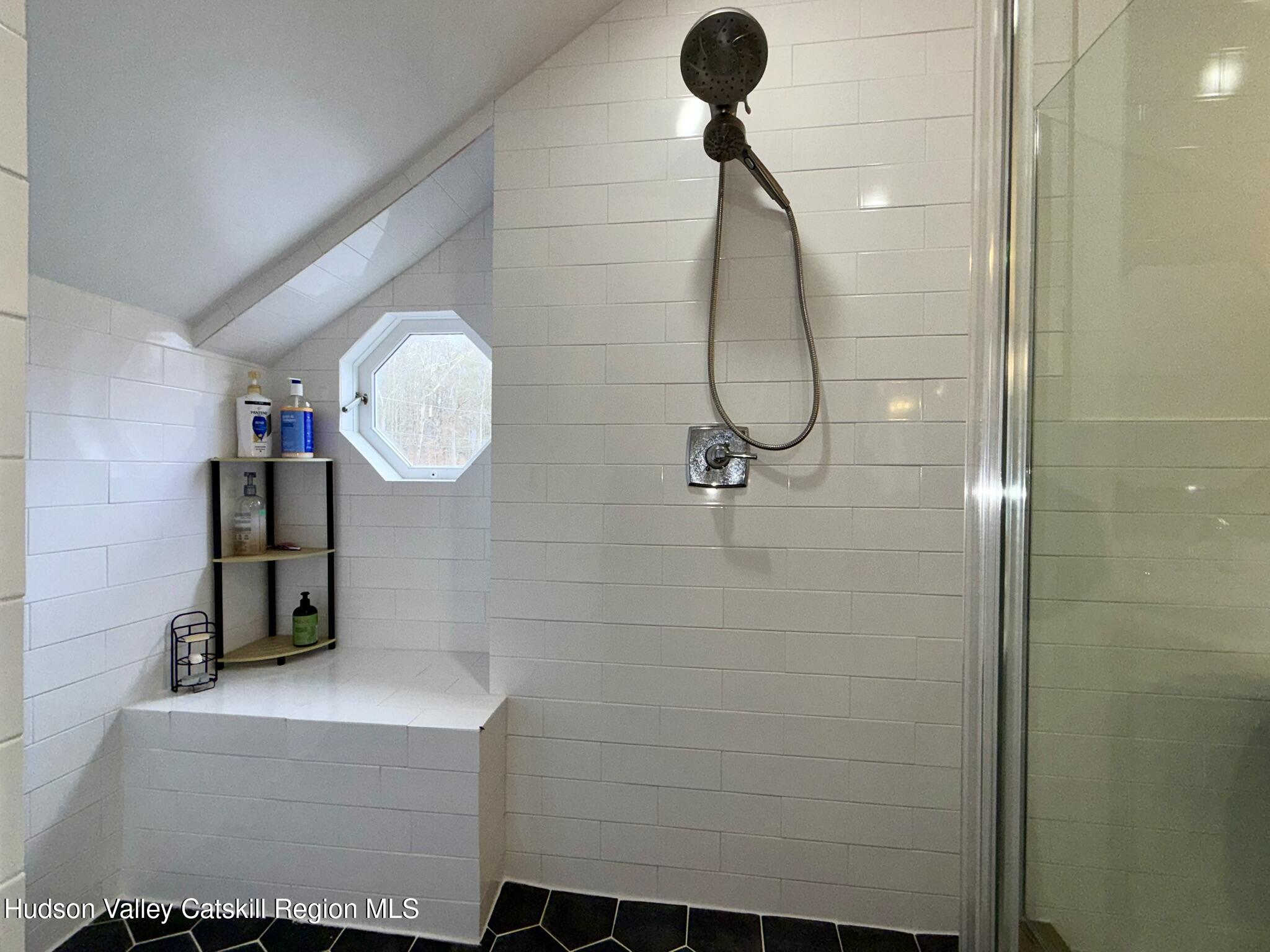 96 West Deans Mill Road New Baltimore, NY 12192 - Photo 46 of 60 a bathroom with a shower and a mirror