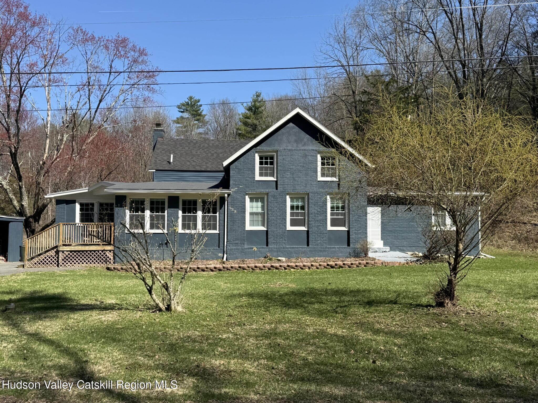 96 West Deans Mill Road New Baltimore, NY 12192 - Photo 47 of 60 a front view of a house with a yard