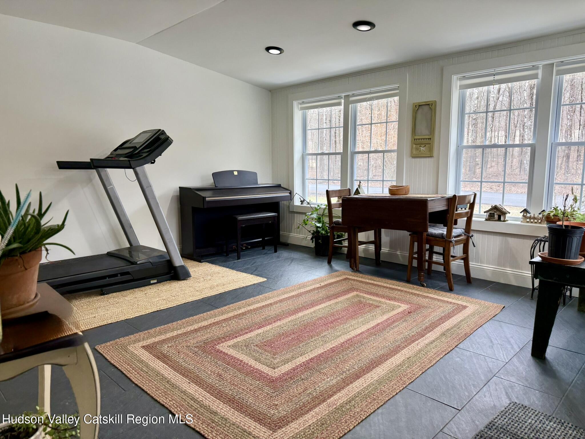 96 West Deans Mill Road New Baltimore, NY 12192 - Photo 5 of 60 a living room with furniture a piano and a table