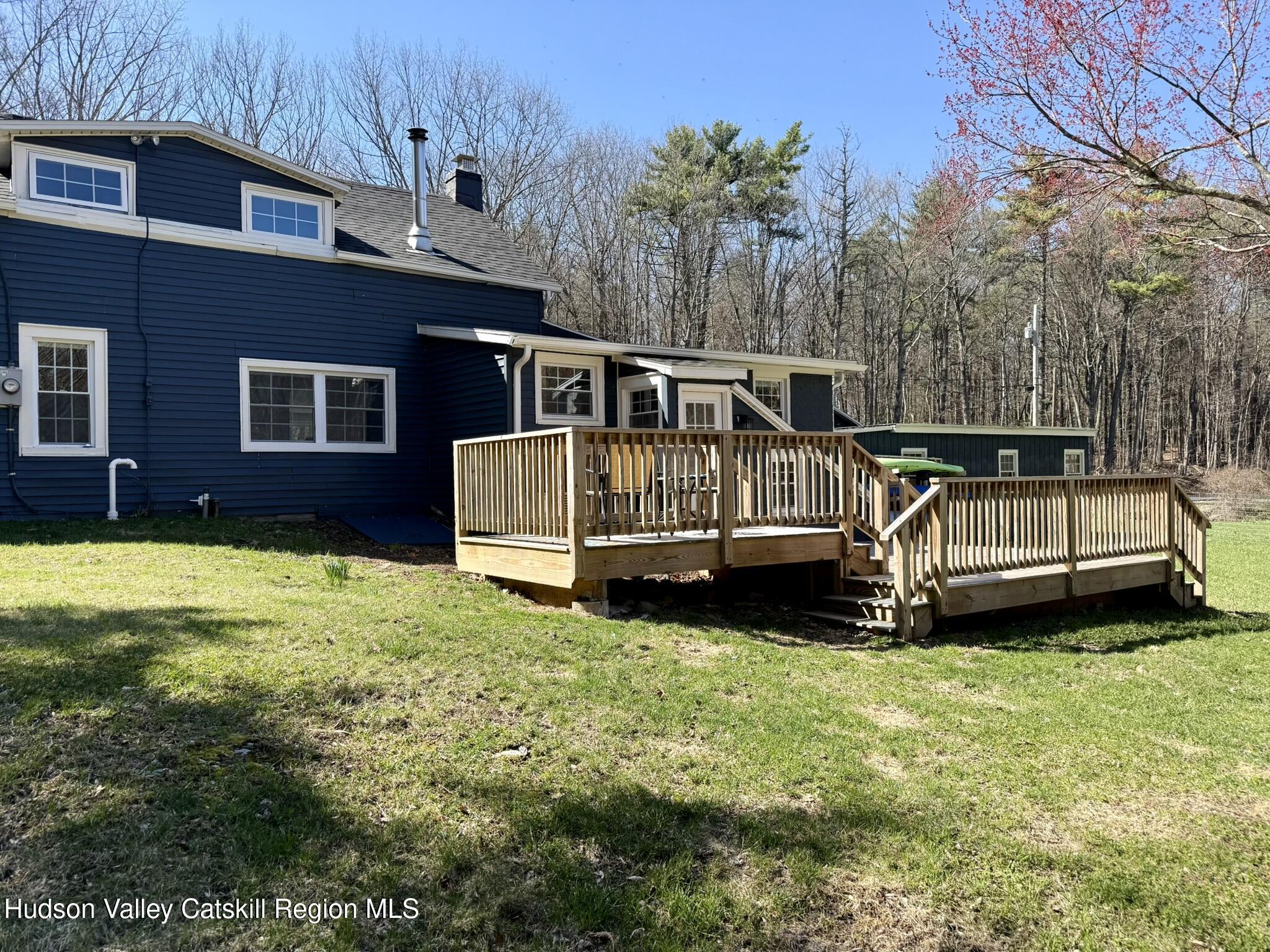96 West Deans Mill Road New Baltimore, NY 12192 - Photo 52 of 60 a view of a house with a yard