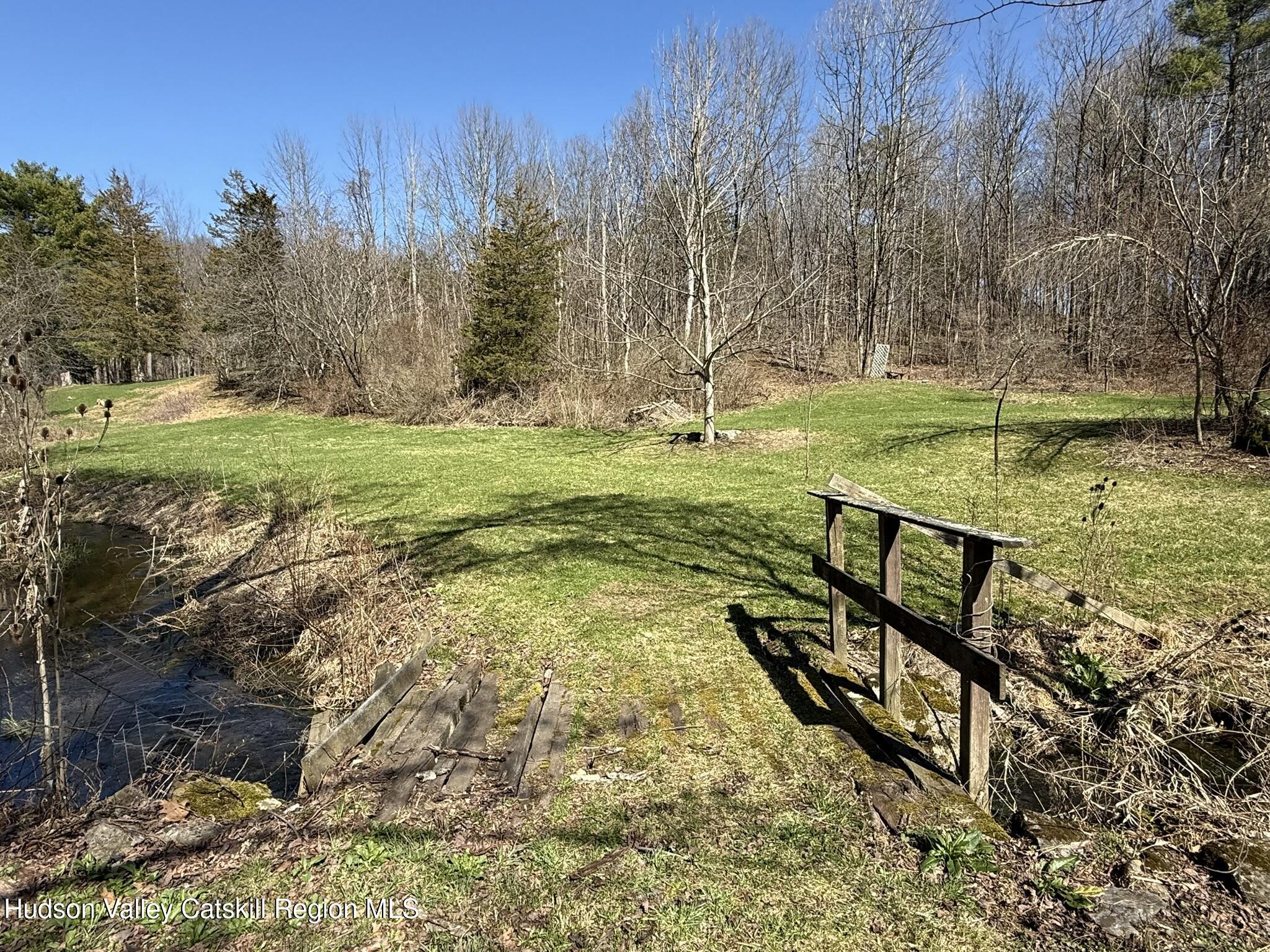 96 West Deans Mill Road New Baltimore, NY 12192 - Photo 53 of 60 a view of a park with large trees
