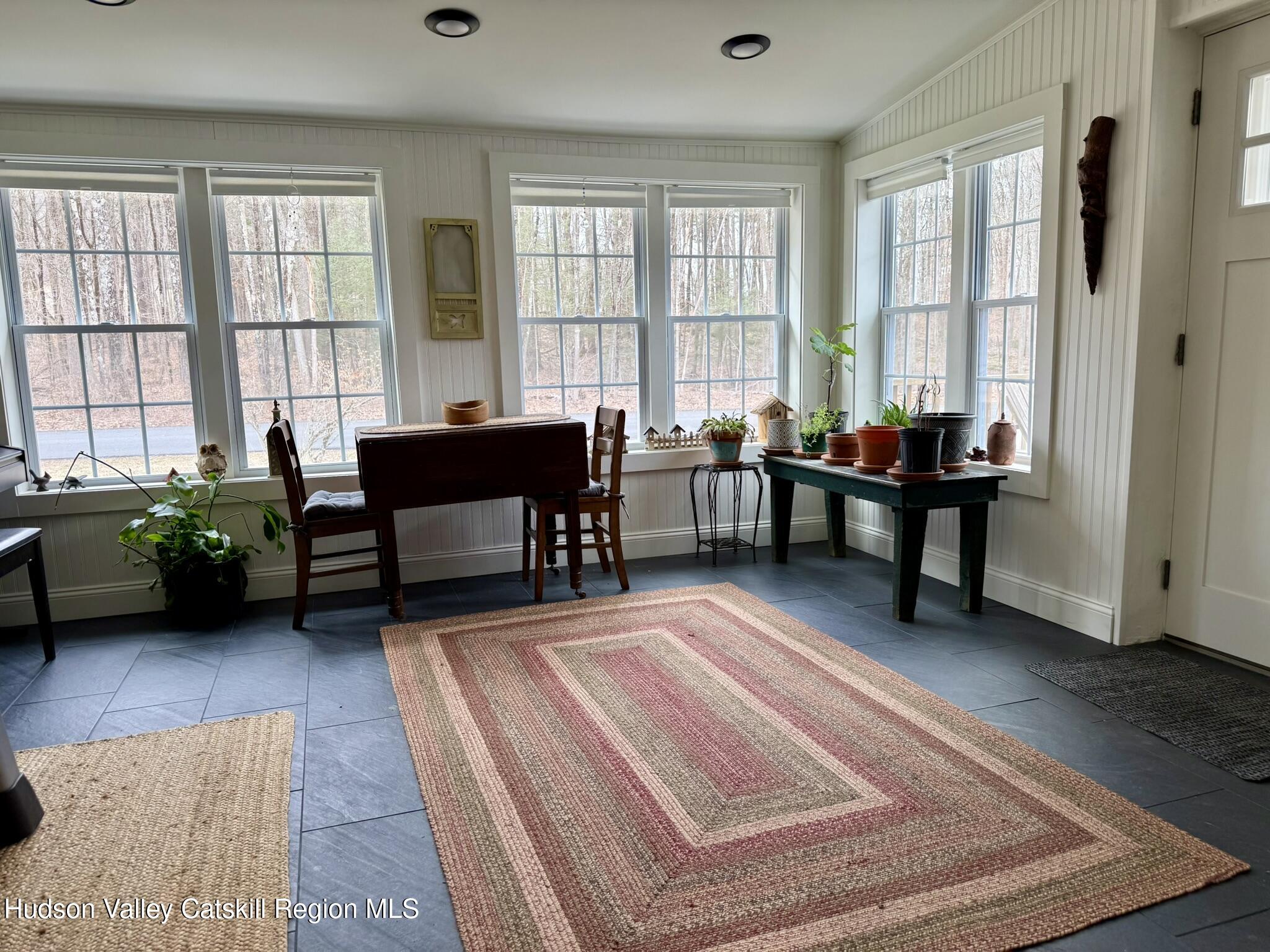 96 West Deans Mill Road New Baltimore, NY 12192 - Photo 6 of 60 a living room with furniture and a window