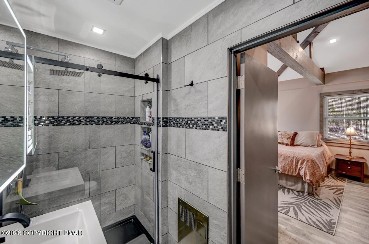 144 Highridge Road Albrightsville, PA 18210 - Photo 52 of 96 a bathroom with a mirror and a shower
