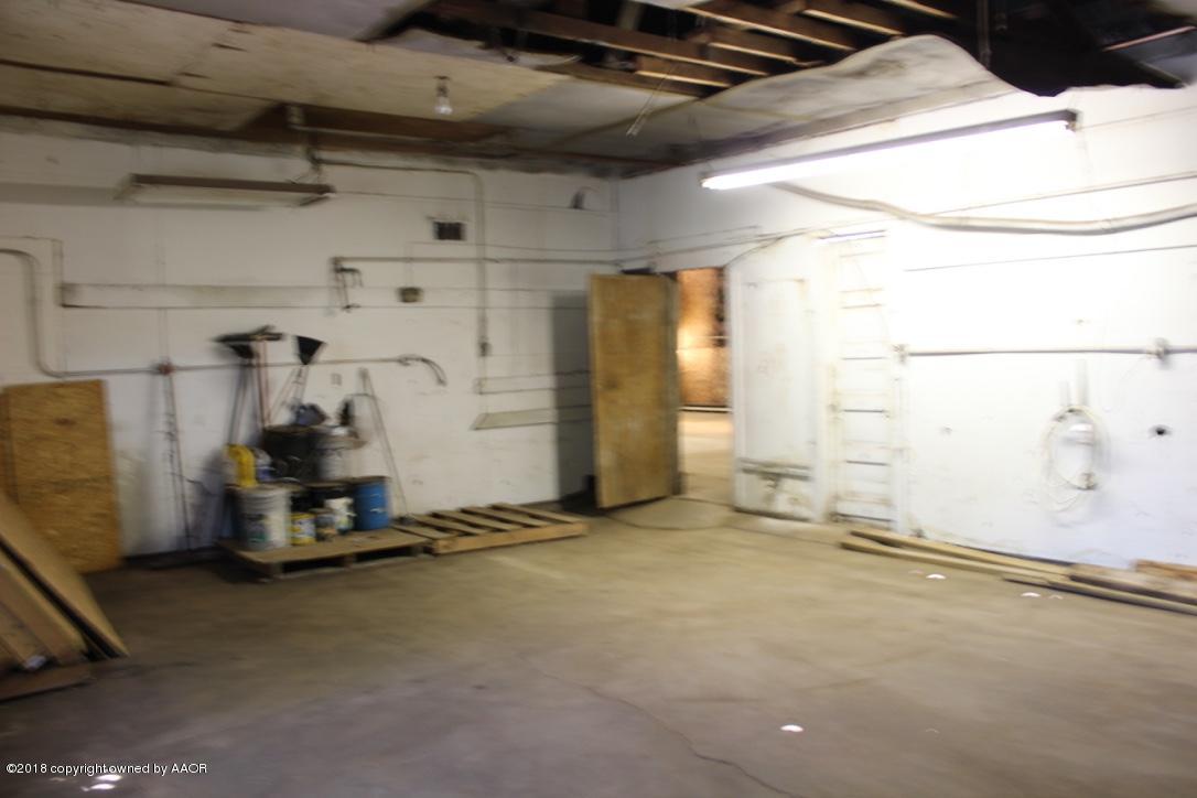 3405 South Taylor Street Amarillo, TX 79110 - Photo 24 of 26 a view of a room with gym equipment