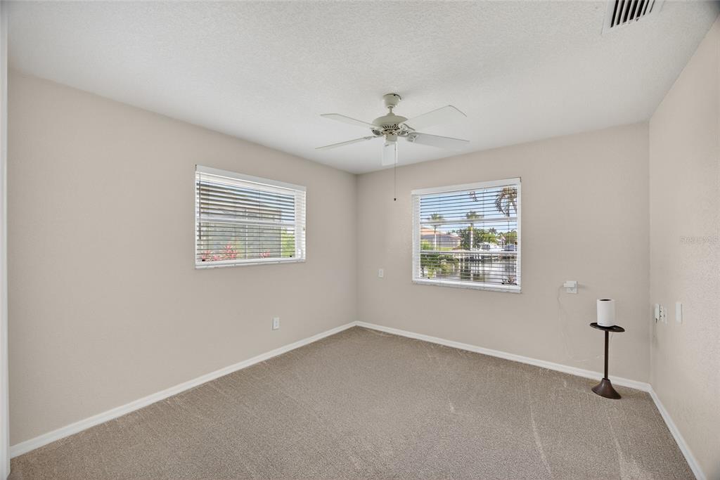 3612 Whippoorwill Boulevard Punta Gorda, FL 33950 - Photo 21 of 40 a view of an empty room with a window