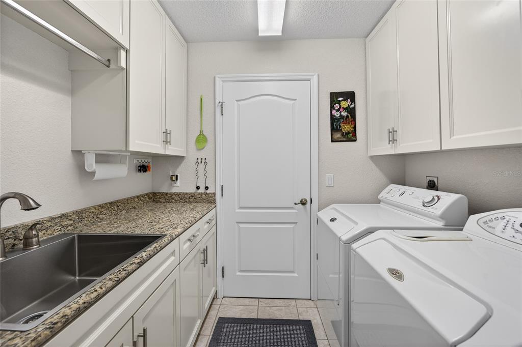 3612 Whippoorwill Boulevard Punta Gorda, FL 33950 - Photo 23 of 40 a view of a kitchen with sink and cabinets