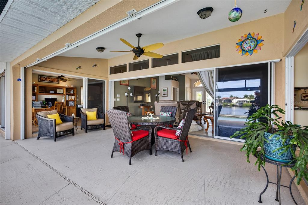 3612 Whippoorwill Boulevard Punta Gorda, FL 33950 - Photo 25 of 40 a view of a patio with table and chairs