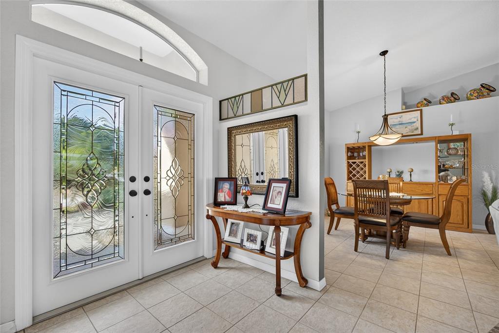 3612 Whippoorwill Boulevard Punta Gorda, FL 33950 - Photo 6 of 40 a dining room with furniture and a floor to ceiling window