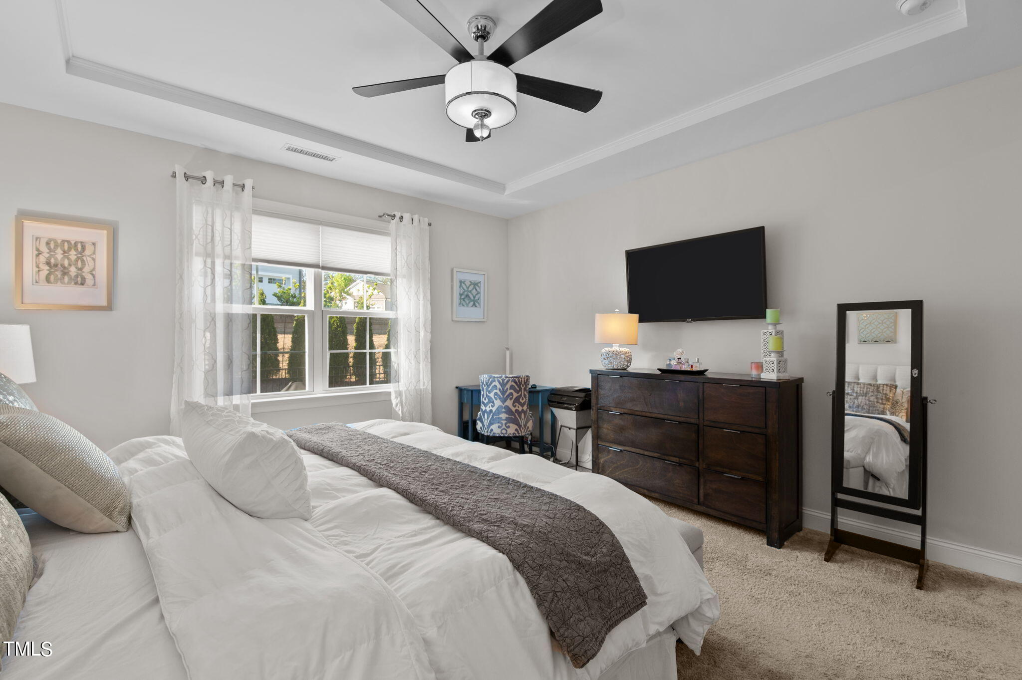 190 Azure Mist Drive Raleigh, NC 27610 - Photo 19 of 39 a bedroom with a bed and a flat screen television
