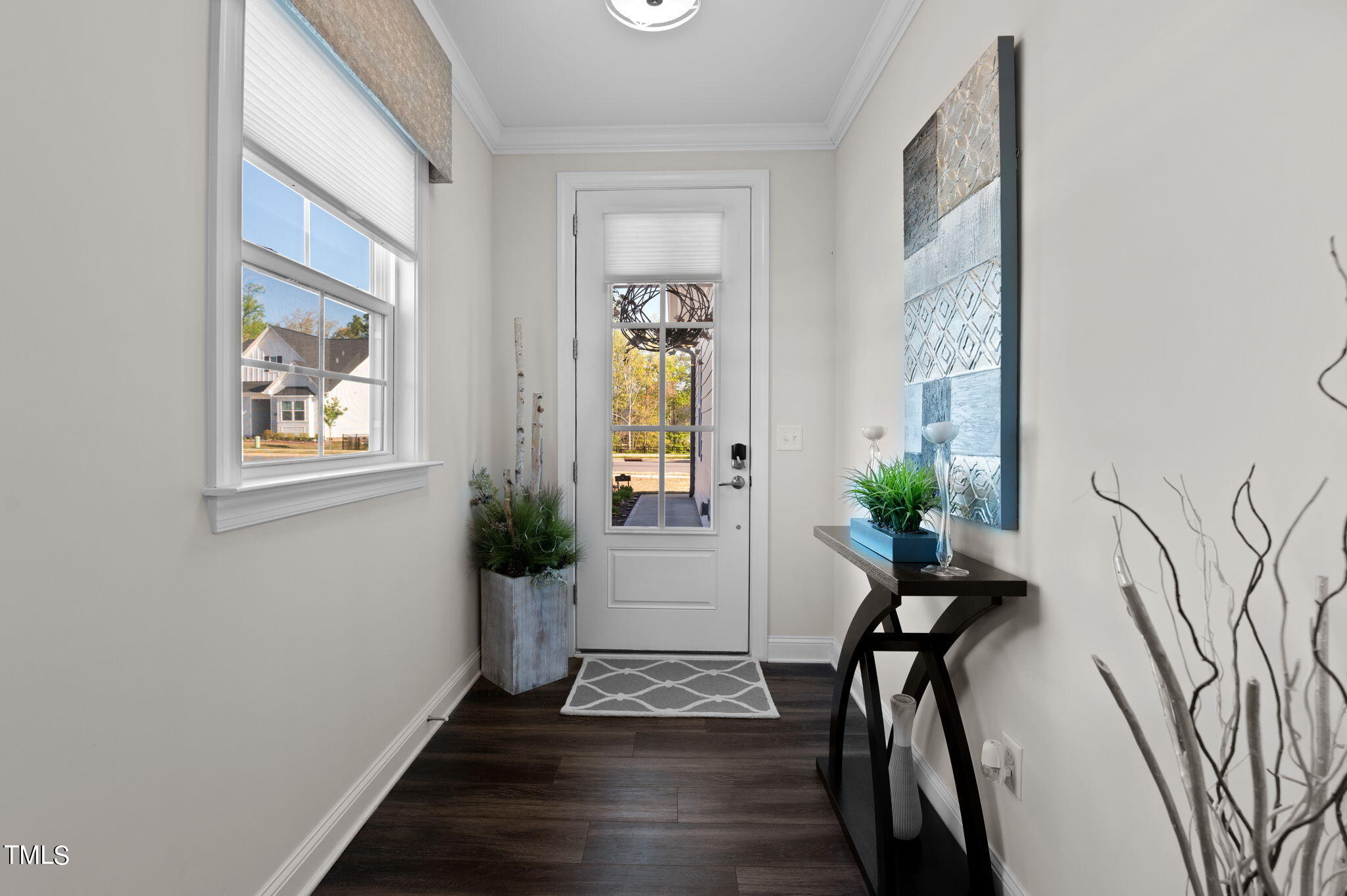 190 Azure Mist Drive Raleigh, NC 27610 - Photo 3 of 39 a view of entryway with wooden floor