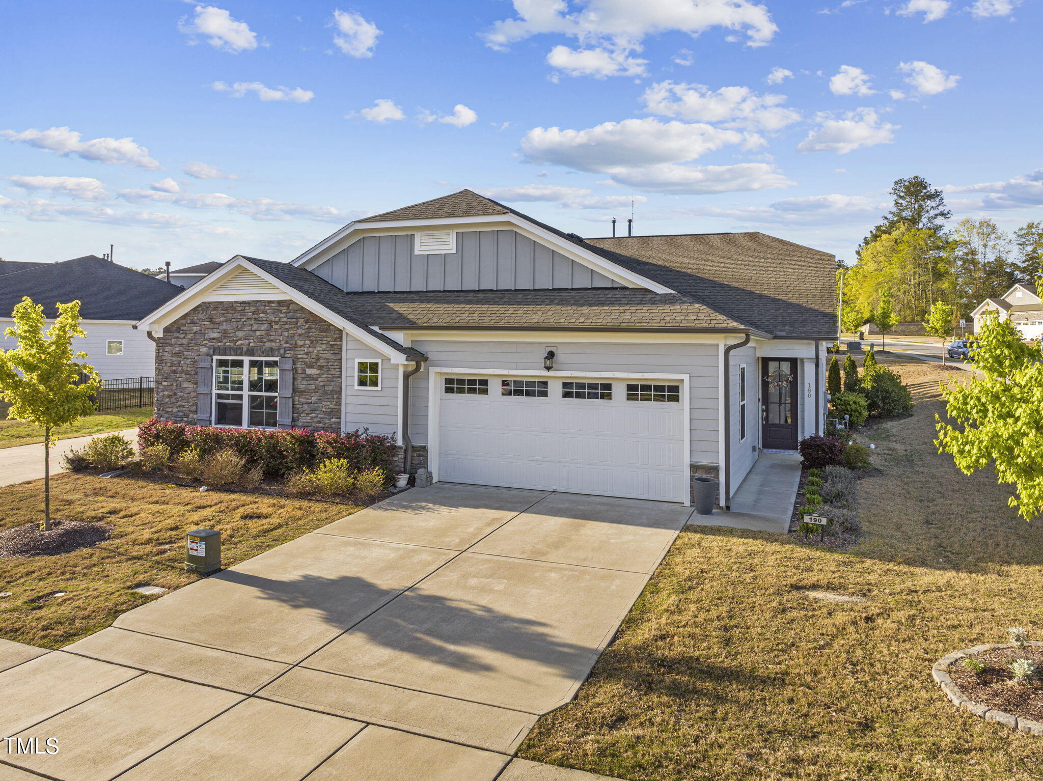 190 Azure Mist Drive Raleigh, NC 27610 - Photo 35 of 39 a front view of a house with a yard and garage