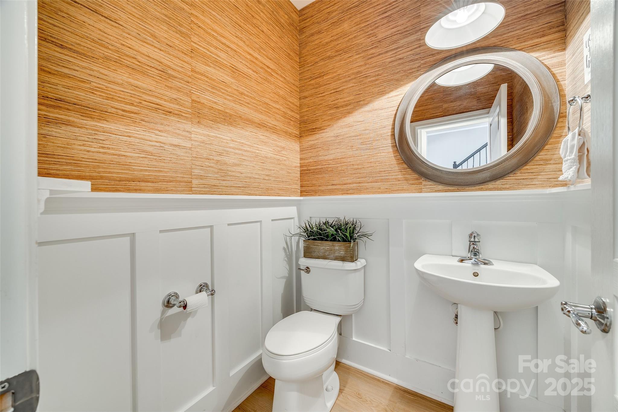 663 6th Baxter Crossing Fort Mill, SC 29708 - Photo 14 of 38 a bathroom with a sink and mirror