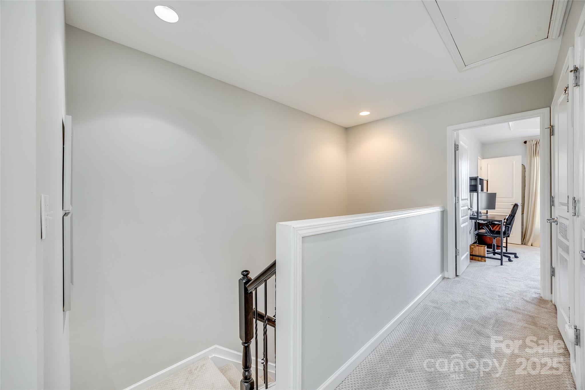 663 6th Baxter Crossing Fort Mill, SC 29708 - Photo 16 of 38 a view of hallway with livingroom and furniture