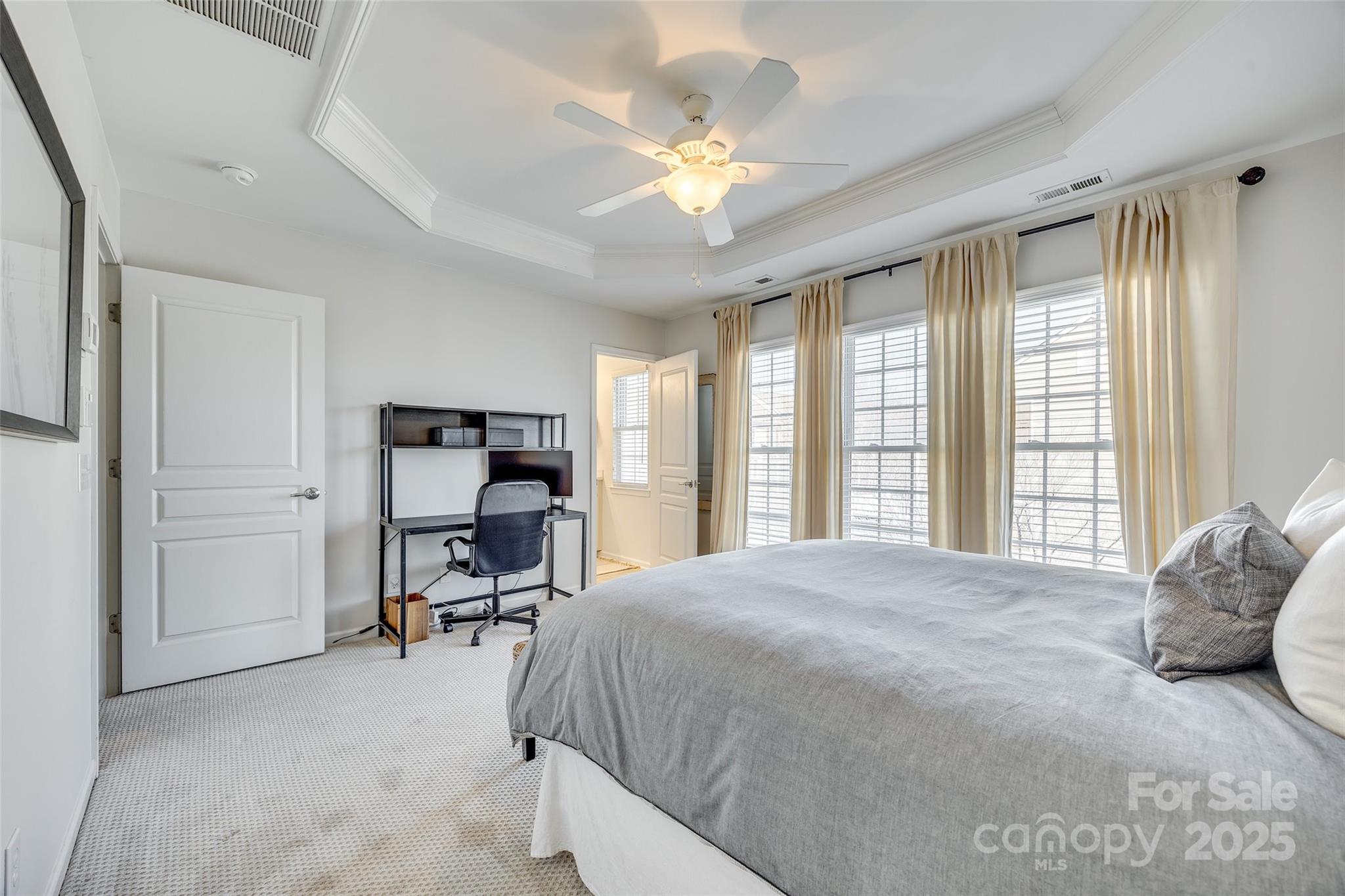 663 6th Baxter Crossing Fort Mill, SC 29708 - Photo 24 of 38 a bedroom with a bed furniture and a large window