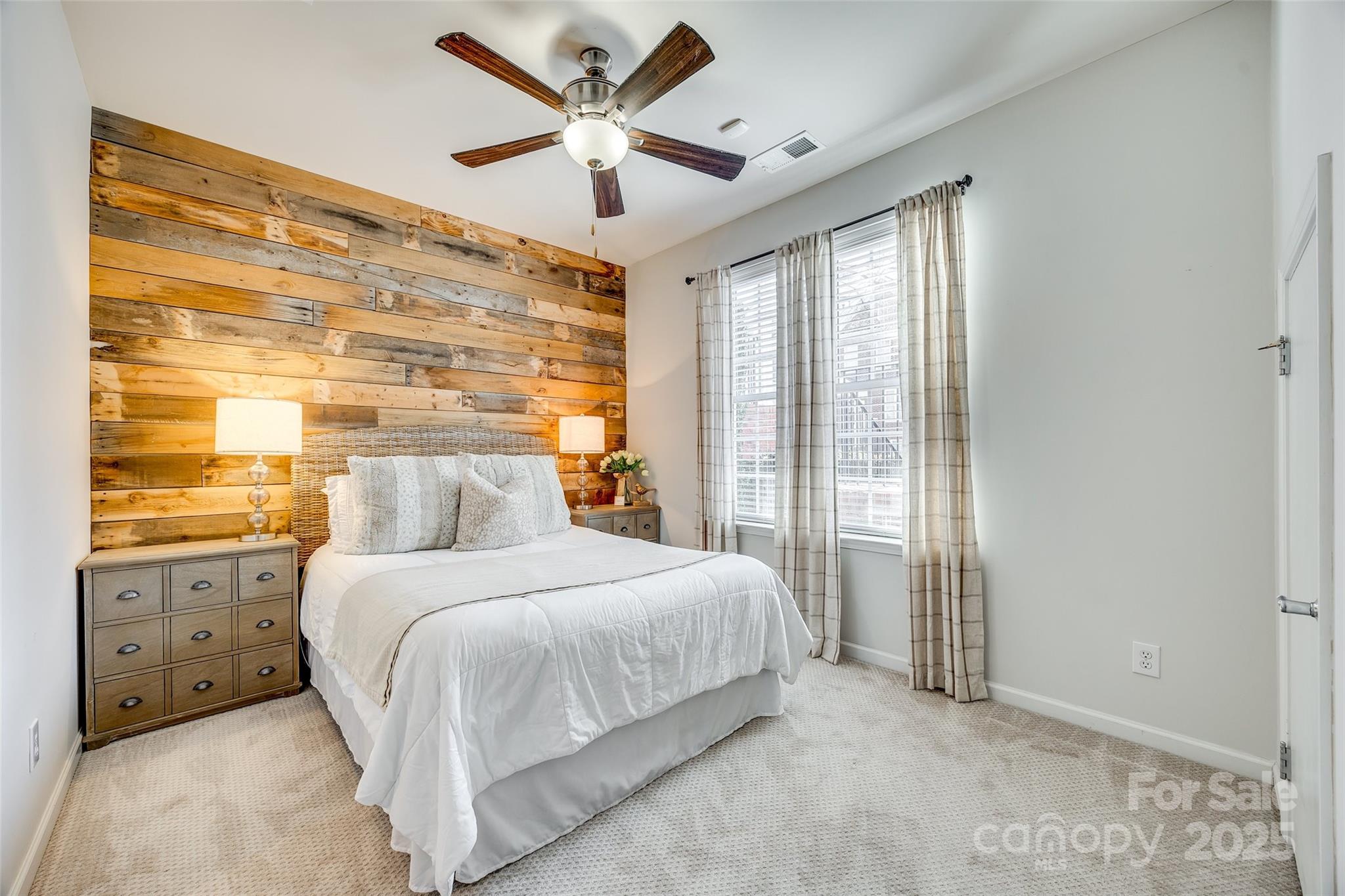 663 6th Baxter Crossing Fort Mill, SC 29708 - Photo 31 of 38 a bedroom with a large bed and a window