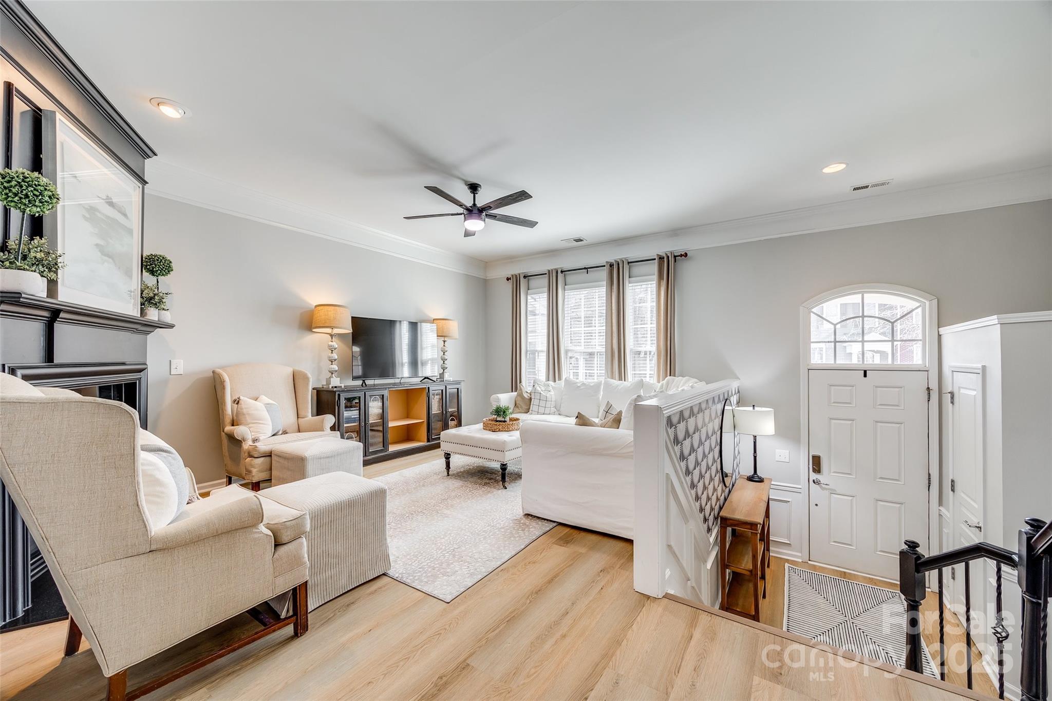 663 6th Baxter Crossing Fort Mill, SC 29708 - Photo 6 of 38 a living room with furniture or wooden floor and a large window