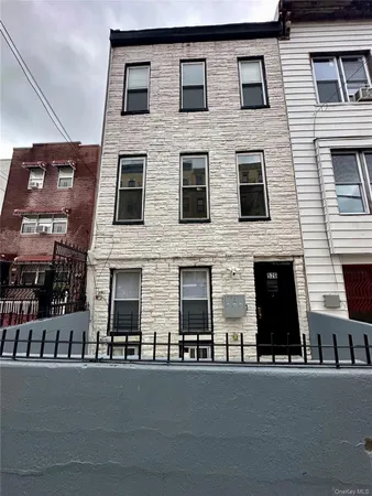 a front view of a building with street