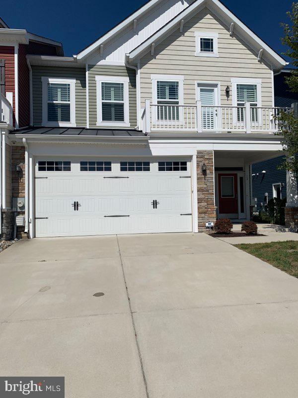 13 Basin Cove Way, Unit T82L Ocean View, DE 19970 - Photo 1 of 28 a view of a white house with large windows
