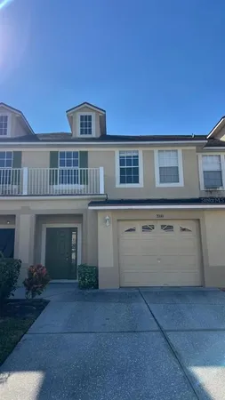 a front view of a house with yard