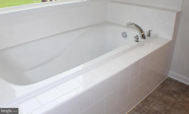 a bathroom with a bathtub