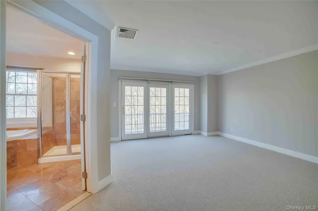 wooden floor and windows in an empty room
