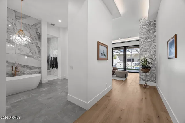 a view of swimming pool with seating area