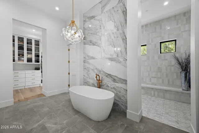 a view of a room with gym equipment and a mirror