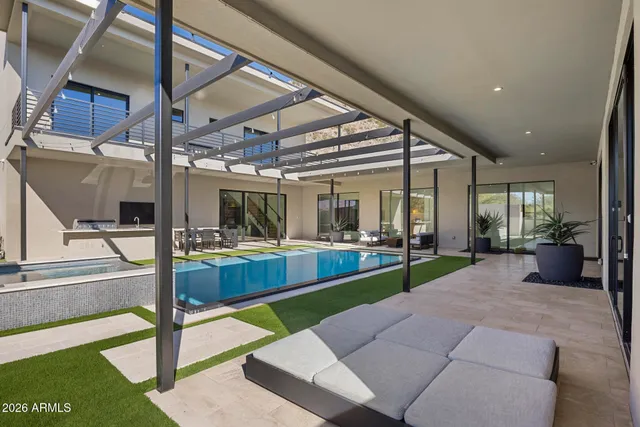 a view of balcony with wooden floor