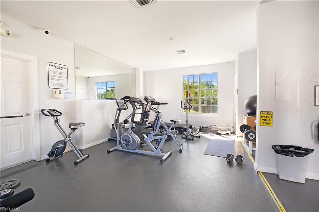 2008 Rookery Bay Drive, Unit 1102 Naples, FL 34114 - Photo 24 of 34 a view of a room with gym equipment