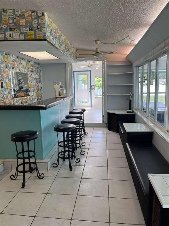 608 Knowles Road Brandon, FL 33511 - Photo 16 of 41 a dining room with furniture and window