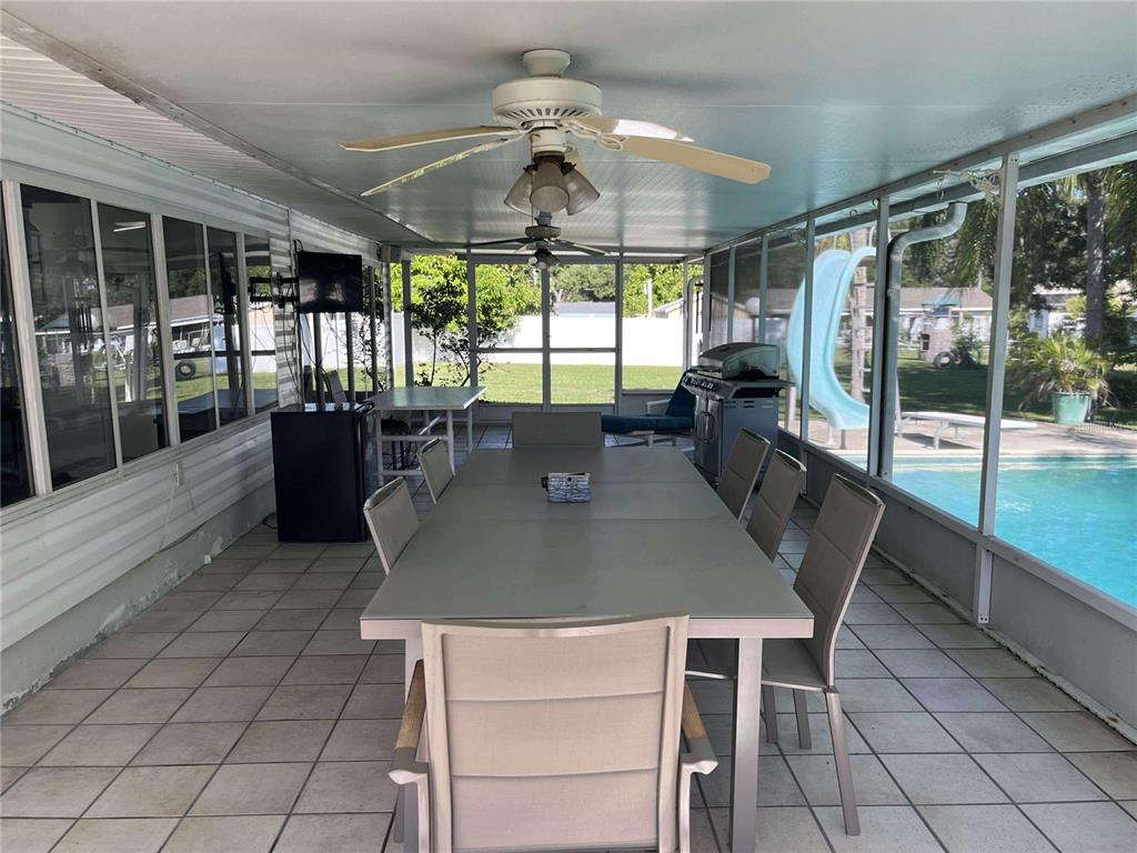 608 Knowles Road Brandon, FL 33511 - Photo 19 of 41 a view of a dining room with furniture window and outside view