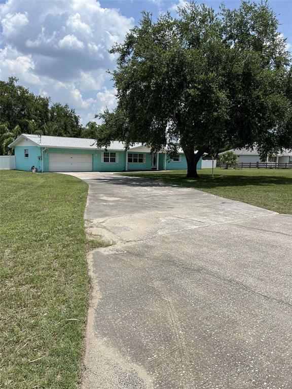 608 Knowles Road Brandon, FL 33511 - Photo 2 of 41 a view of outdoor space yard and green space