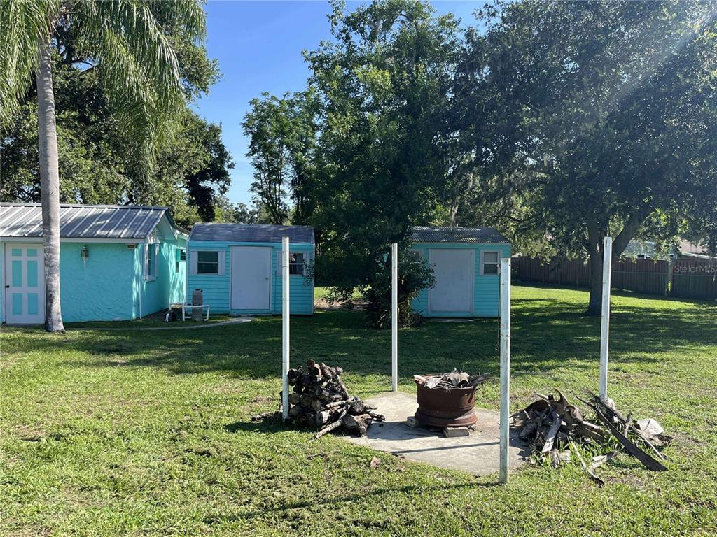 608 Knowles Road Brandon, FL 33511 - Photo 24 of 41 a view of a wooden deck and a yard