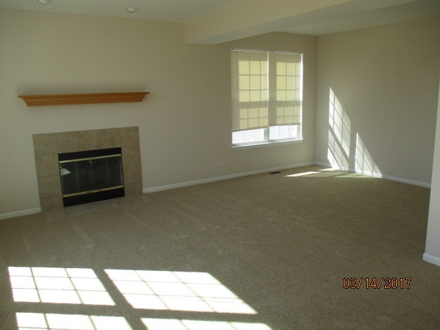 204 Wilkins Road Sycamore, IL 60178 - Photo 13 of 24 a view of an empty room with a window