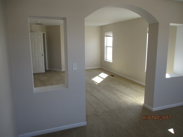 204 Wilkins Road Sycamore, IL 60178 - Photo 17 of 24 a view of an empty room and window