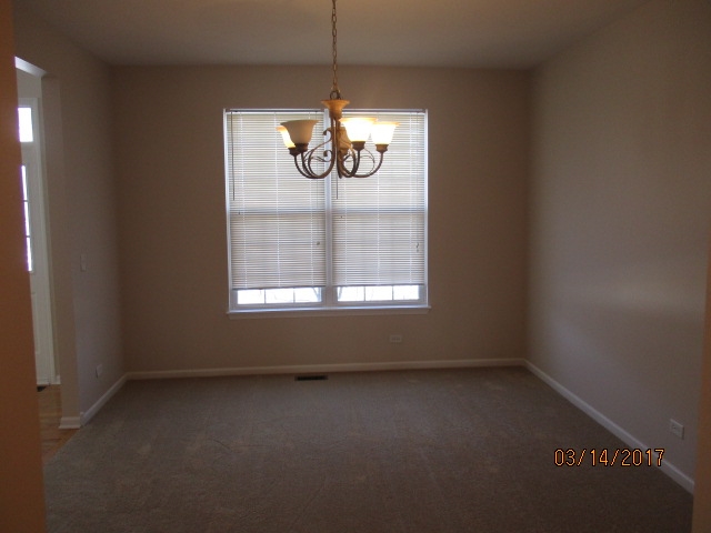 204 Wilkins Road Sycamore, IL 60178 - Photo 7 of 24 a view of room with window