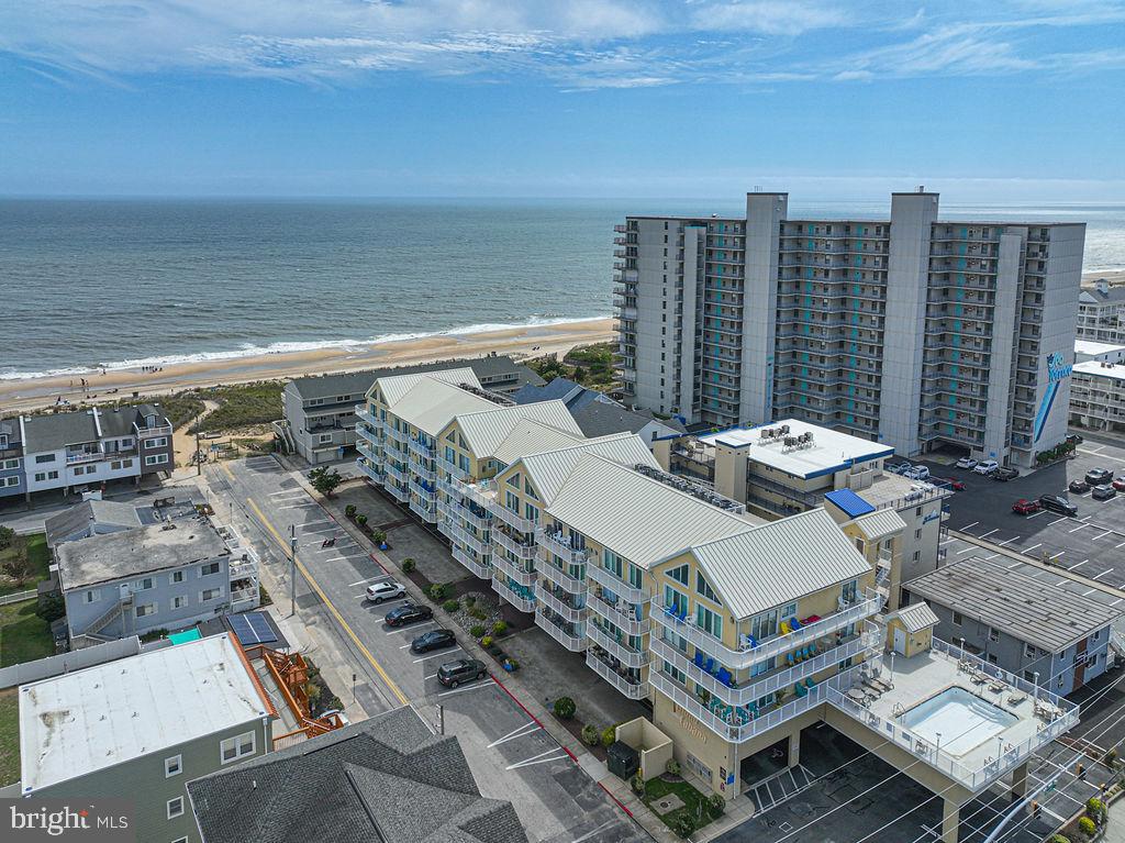 9 90th Street, Unit 102 Ocean City, MD 21842 - Photo 2 of 42 a view of a city with tall buildings