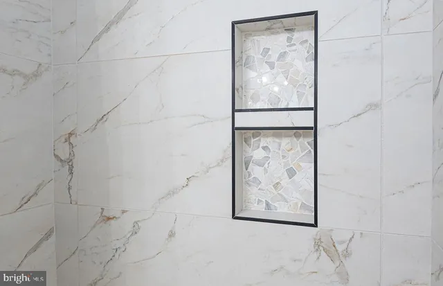 a spacious bathroom with a sink and a toilet